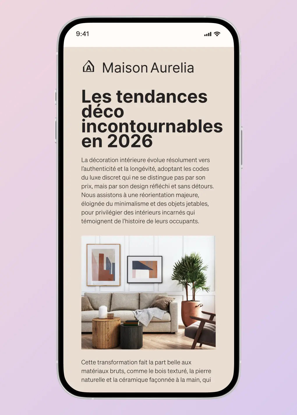 Écran de smartphone affichant un article de "Maison Aurelia" sur les tendances déco incontournables en 2026, avec une image de salon moderne.