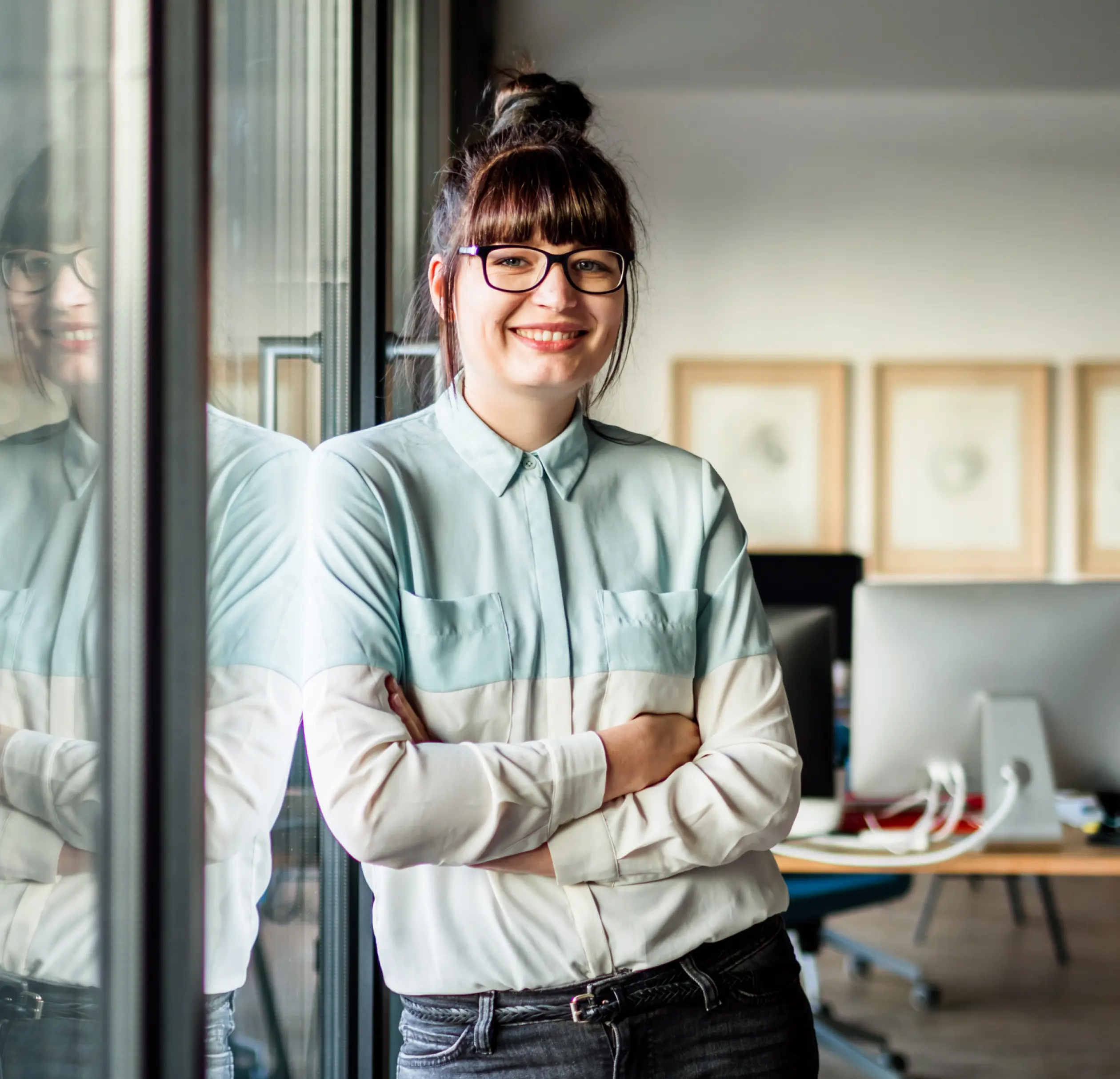 woman writing at her desk