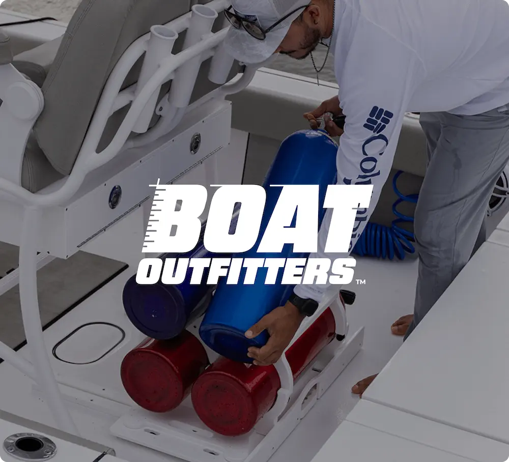Man arranging colored tanks on a boat with "Boat Outfitters" text overlay.