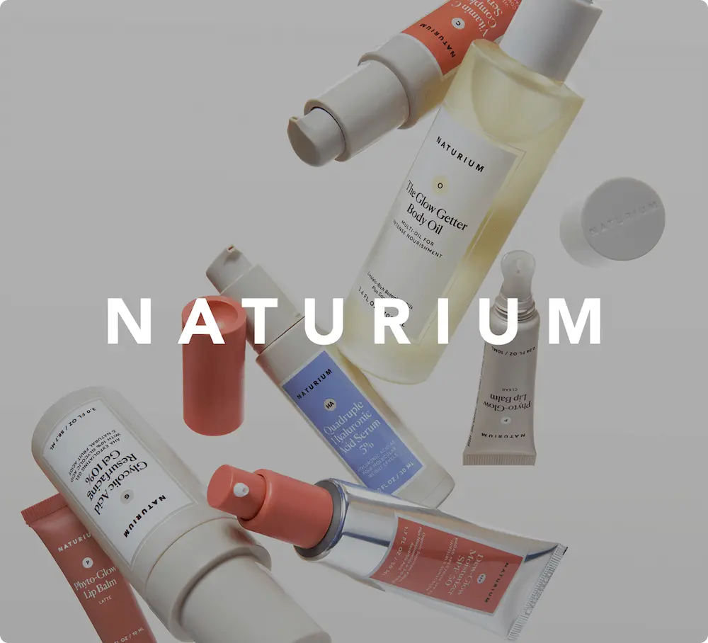 Assorted Naturium skincare products with the brand name "NATURIUM" overlaid in bold white text.