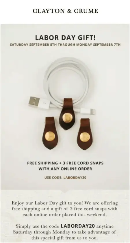 Image shows a Labor Day marketing email from leather goods brand Clayton & Crume, featuring a cream color palette and the headline, “Labor Day gift!” The email body contains a close-up photo of the free gift in action—3 leather cord snaps—and the copy, “Free shipping + 3 free cord snaps with any online order. Use code: LaborDay20.”