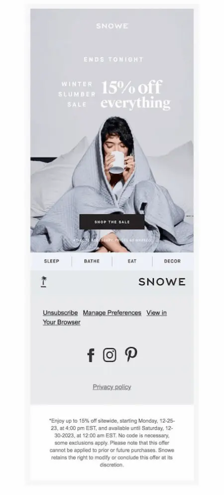 Image shows a New Year’s marketing campaign from home essentials brand Snow, featuring a photo of a person with dark hair wrapped in a blanket in bed, sipping from a mug. The email copy is simple and straightforward, reading, “ends tonight: winter slumber sale, 15% off everything,” with a “shop the sale” CTA button."