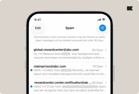 iOS-26-spam-folder Smartphone screen displaying a spam email folder with messages from suspicious senders like "global.rewardcenter@abc.com".